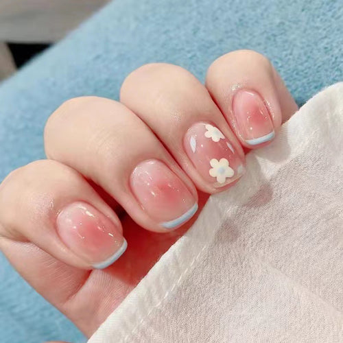 Artistic gel nails with delicate floral designs Bowlift