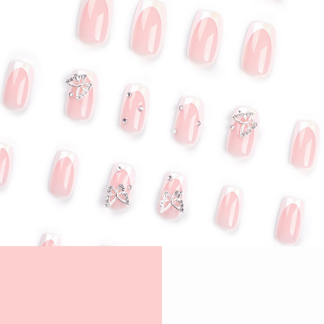 Elegant Nail Art with Glitter and Floral Accents Bowlift