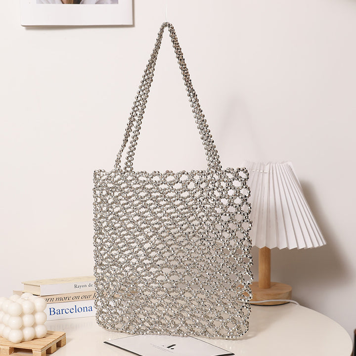 Sparkling Net Handbag Made of Braided Material Bowlift