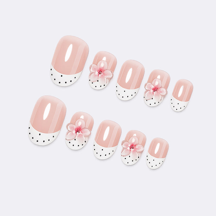 Artificial nail set with delicate floral designs and elegant accents Bowlift