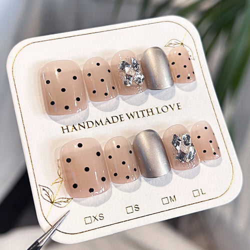 Artificial nail extensions with elegant accent decoration Bowlift