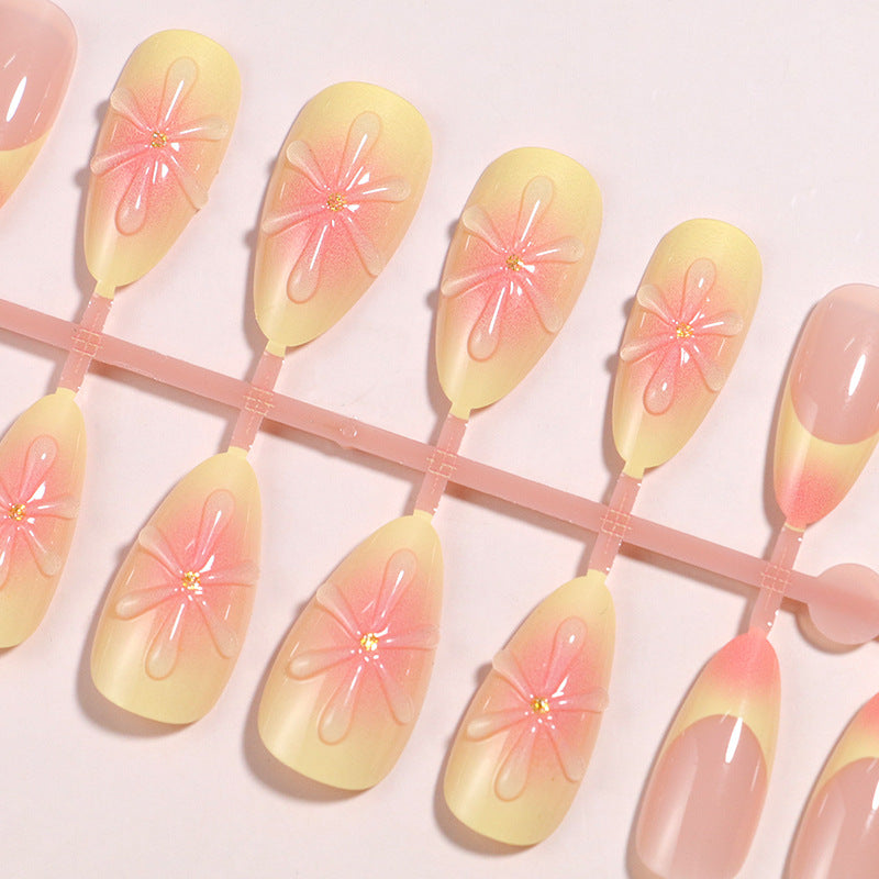Artistic Press-On Nail Set with Floral Accents Bowlift