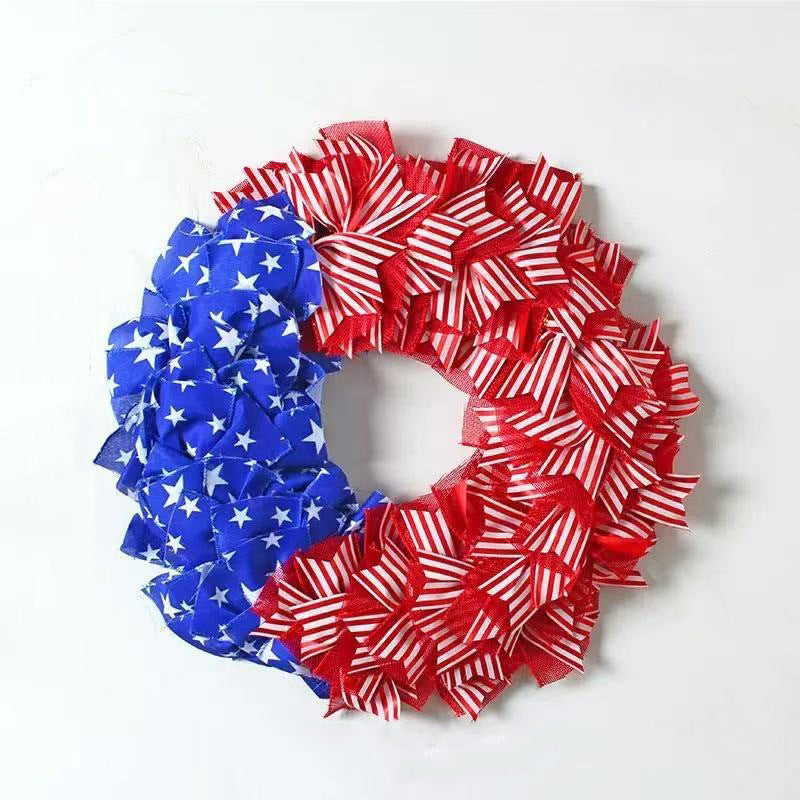 Unisex decorative door wreath with layered fabric bows and star appliqués Bowlift