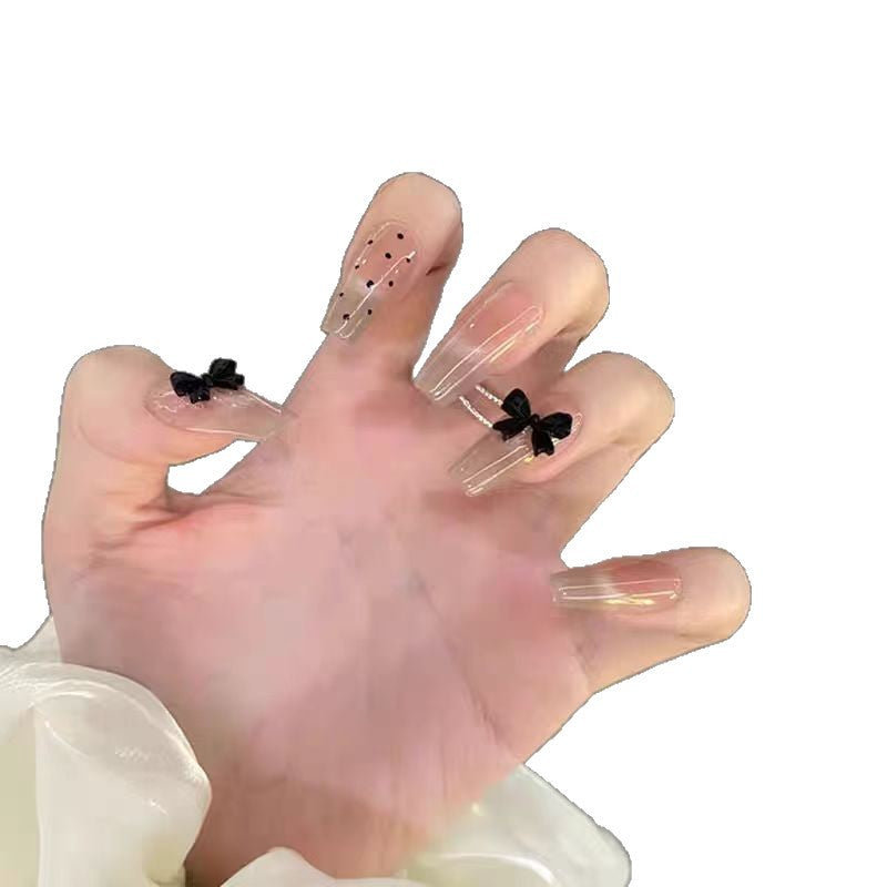 Artificial nails with playful bow design Bowlift