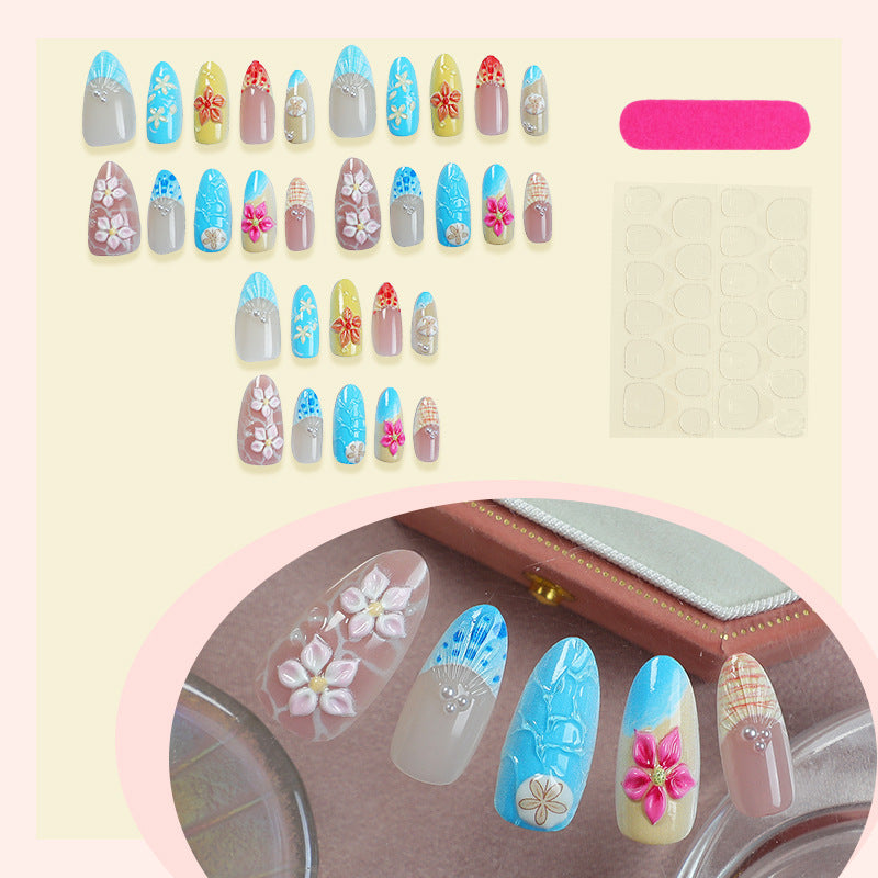 Elegant artificial nail set with floral details and glitter accents Bowlift