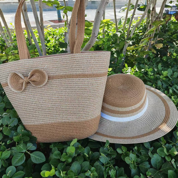 Elegant sun hat with wide brim and subtle stripe pattern Bowlift