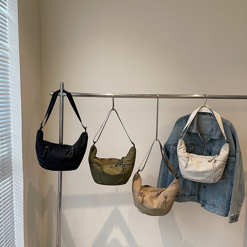 Practical shoulder bag with external zip pockets Bowlift