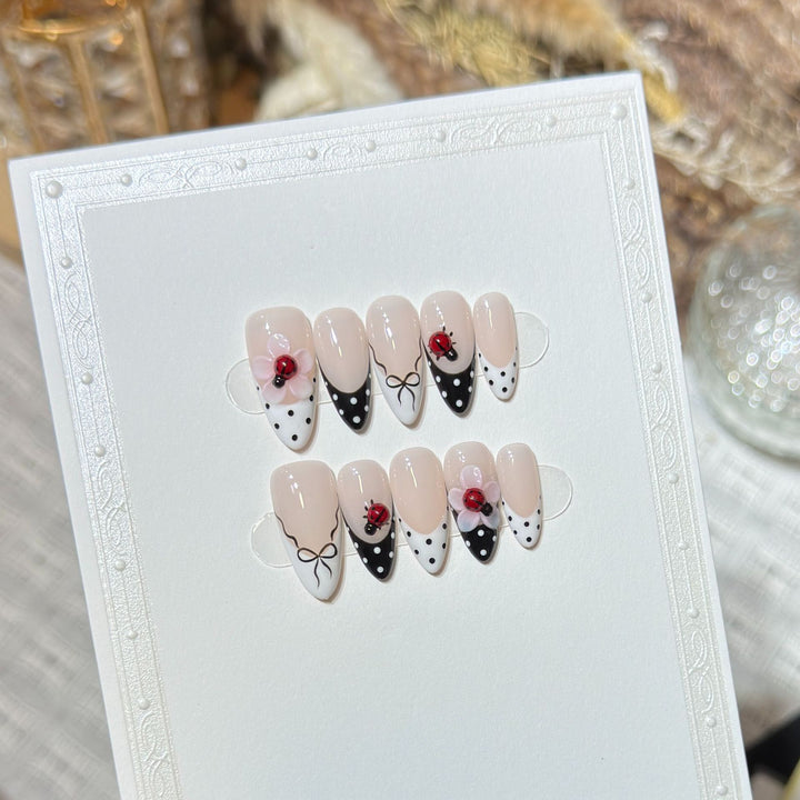 Artistic Stiletto Press-On Nail Set with Floral and Insect Designs Bowlift