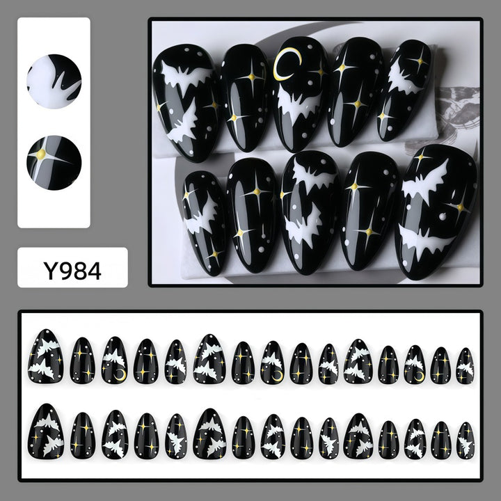 Artificial nails in creative Halloween bat design Bowlift
