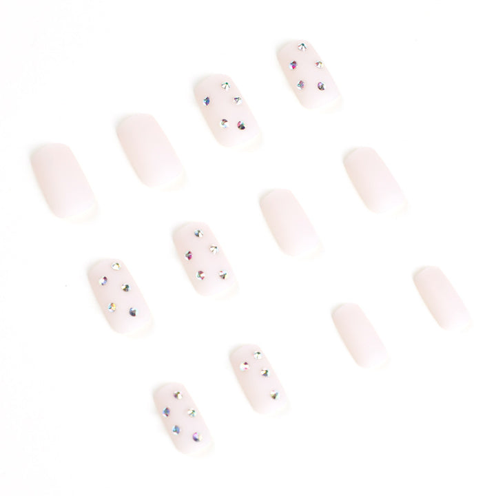 Artistic nail art with elegant rhinestone embellishments Bowlift