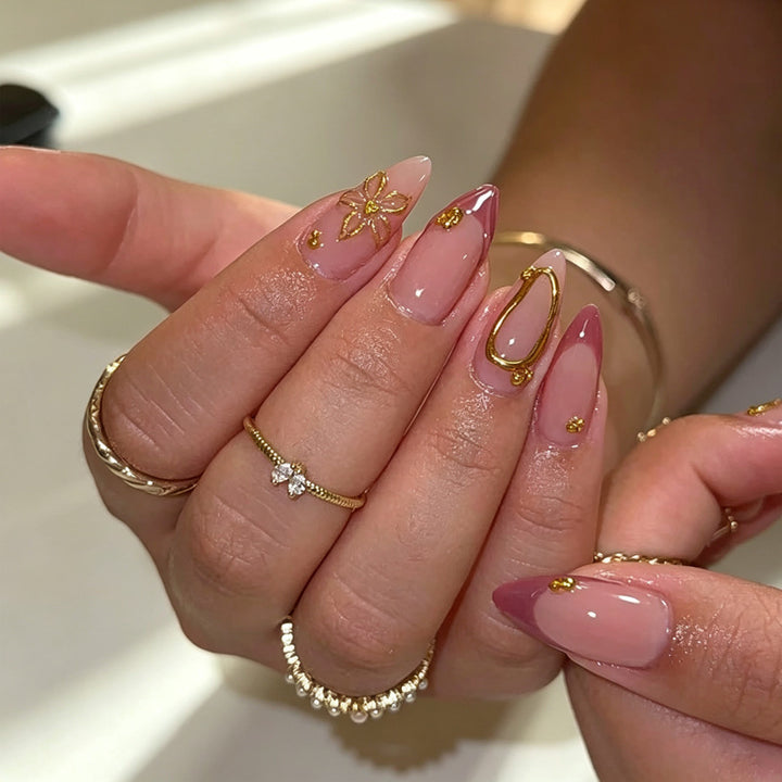 Artful nail tips with delicate gold accents Bowlift