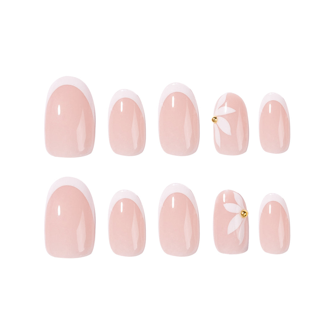 Artful French nails with delicate flowers and glitter accents Bowlift