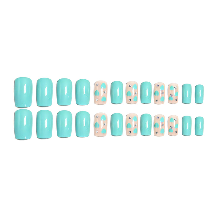 Nail art with heart designs and glitter accents Bowlift