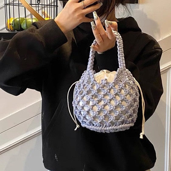Fashionable handbag made of braided material Bowlift