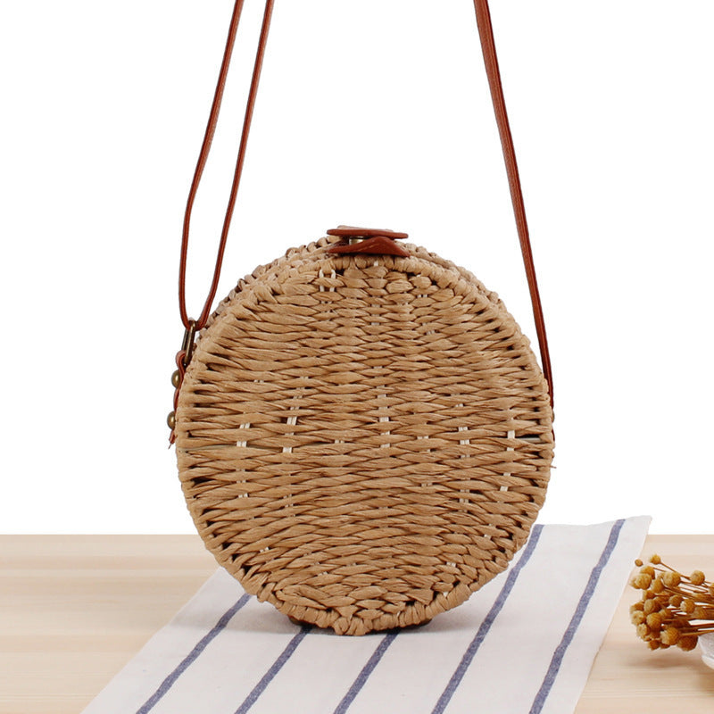 Round basket bag with leather accents Bowlift