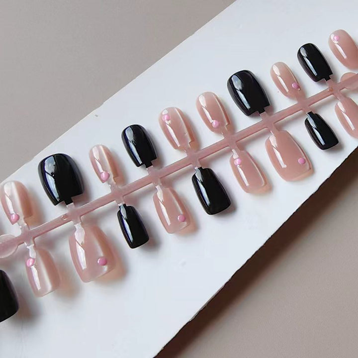 Artificial nails in elegant black-pink design Bowlift