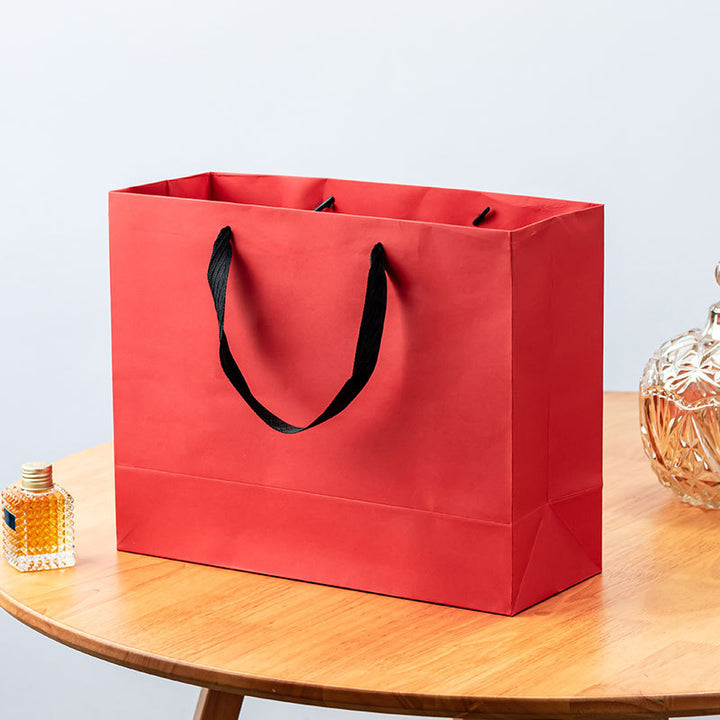 Premium Reusable Paper Gift Bag with Ribbon Handles and Reinforced Base Bowlift
