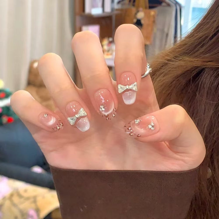 Artistic Press-On Nail Set with Unique Bow and Heart Accents Bowlift