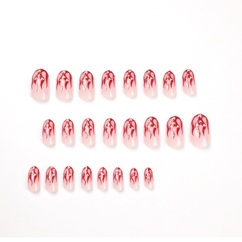 Artificial nail art with romantic heart and flame design Bowlift