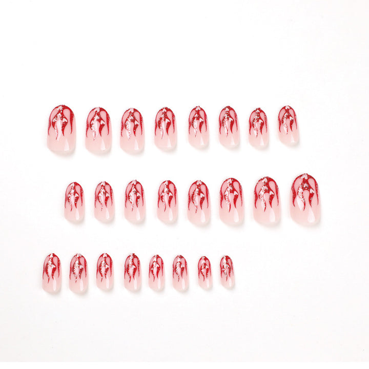 Artificial nail art with romantic heart and flame design Bowlift