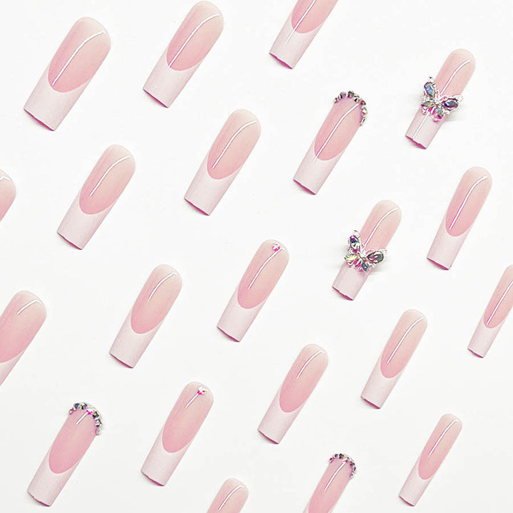 Acrylic nail set with elegant design and sparkling rhinestone accents Bowlift
