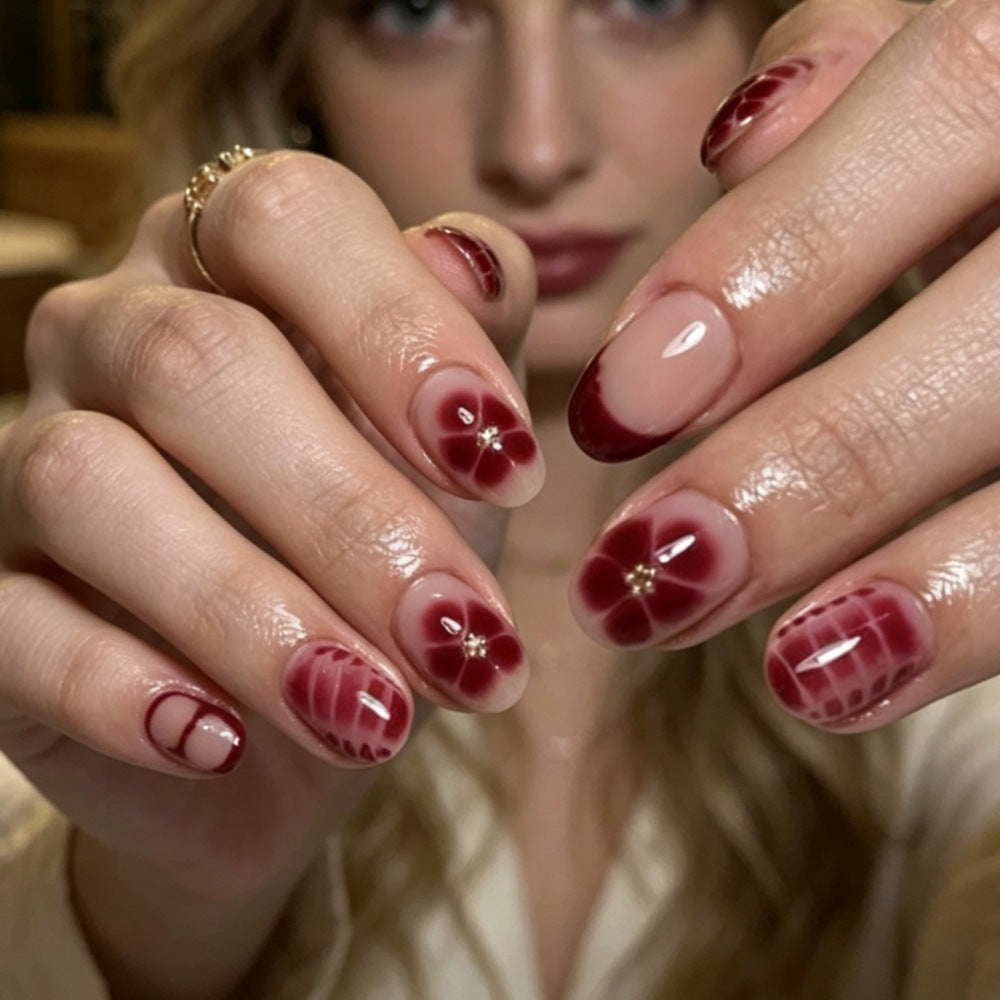 Artistic Press-On Nail Set with Floral Designs Bowlift