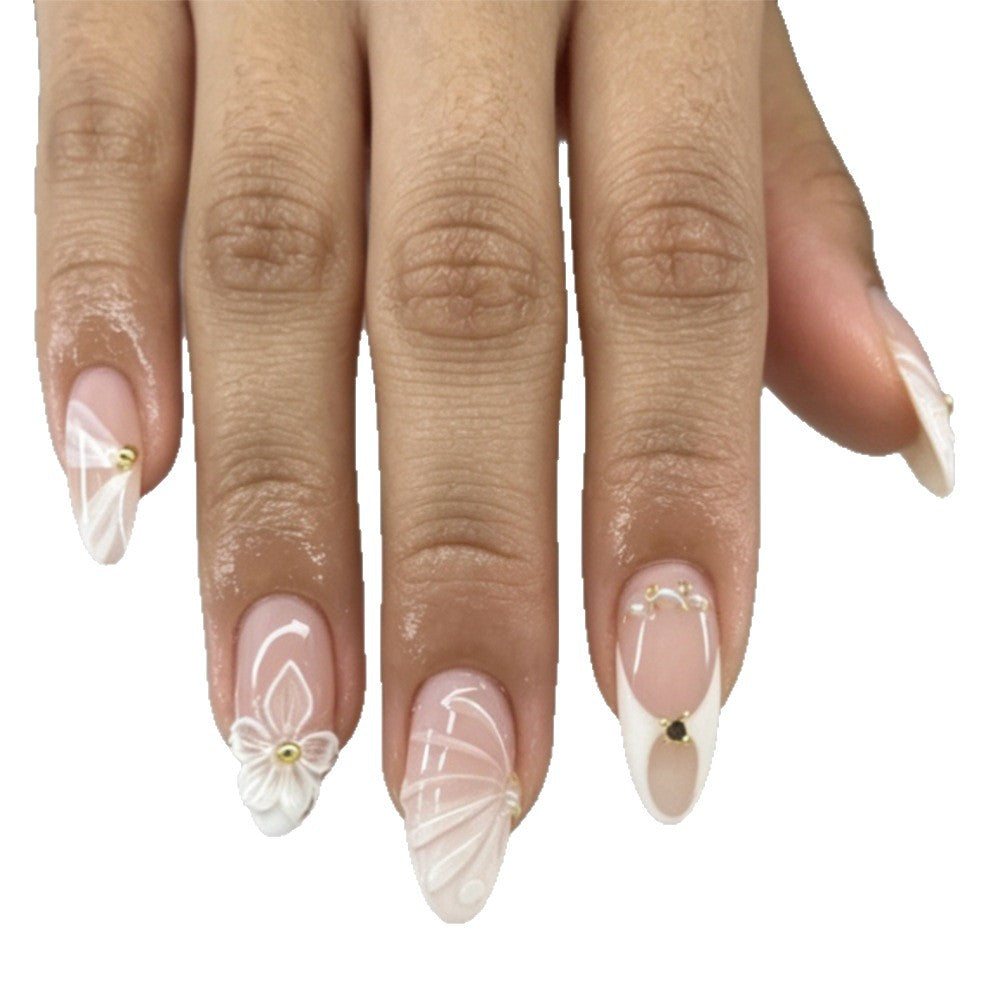 Artificial nails with elegant flower design and glitter accents Bowlift