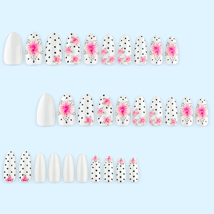 Artificial nail set with floral accents and polka dots Bowlift