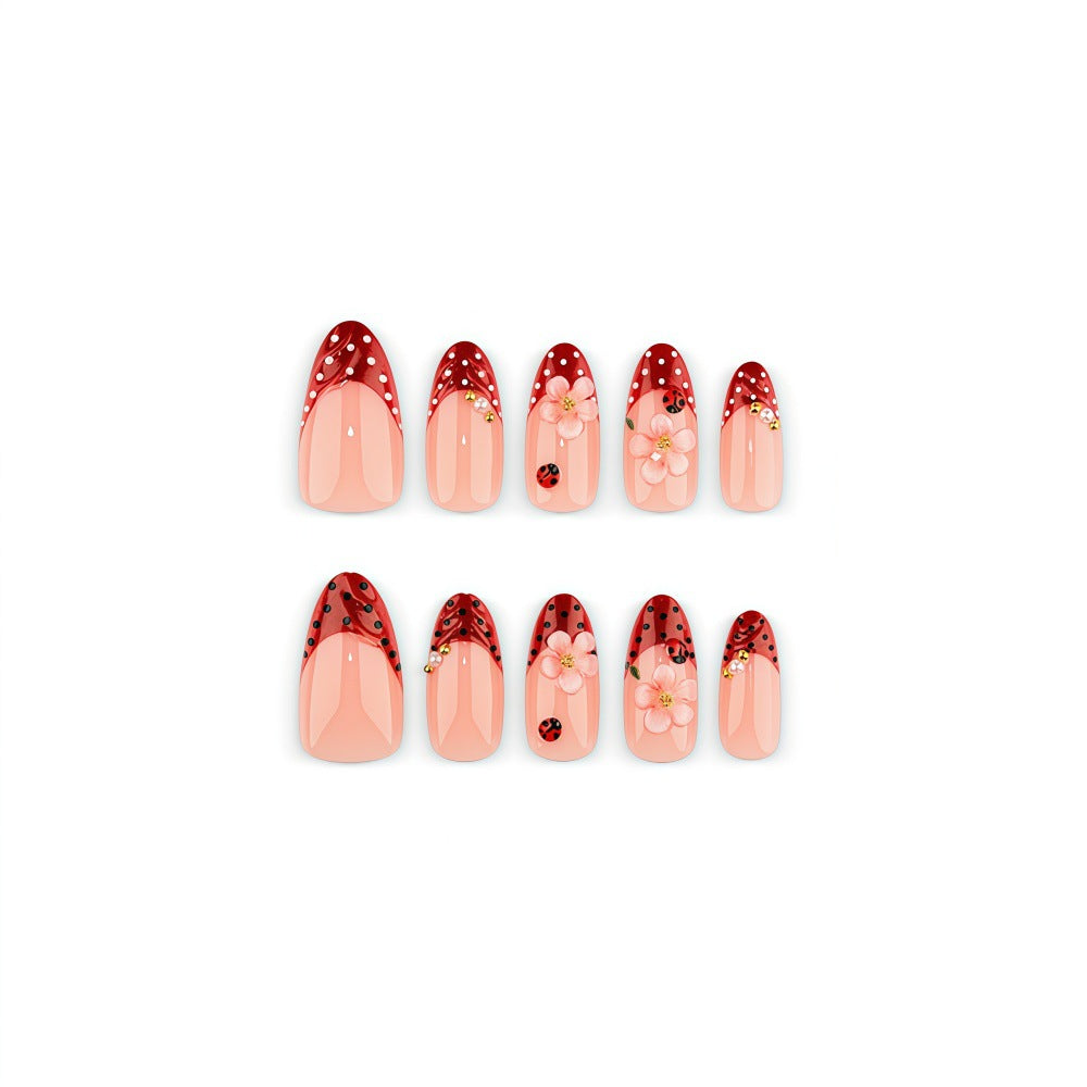 Artificial nails with floral design and 3D accents Bowlift