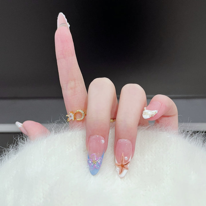 Artistic Press-On Nail Art Set with Floral and Starfish Design Bowlift