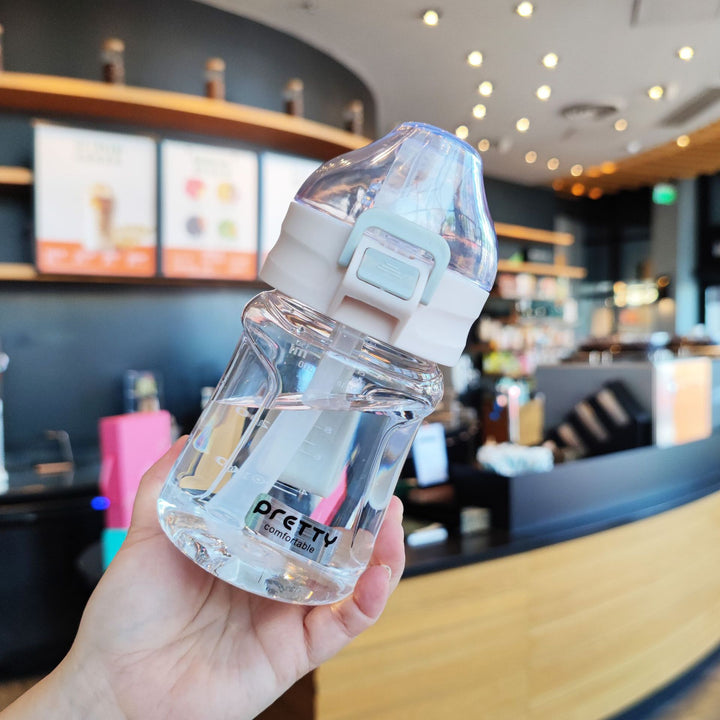 Women's ergonomic drinking bottle with secure screw cap Bowlift