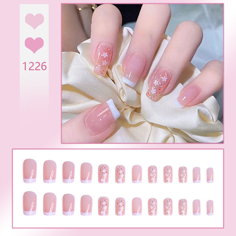 Nail art set with floral decorations and elegant French design Bowlift