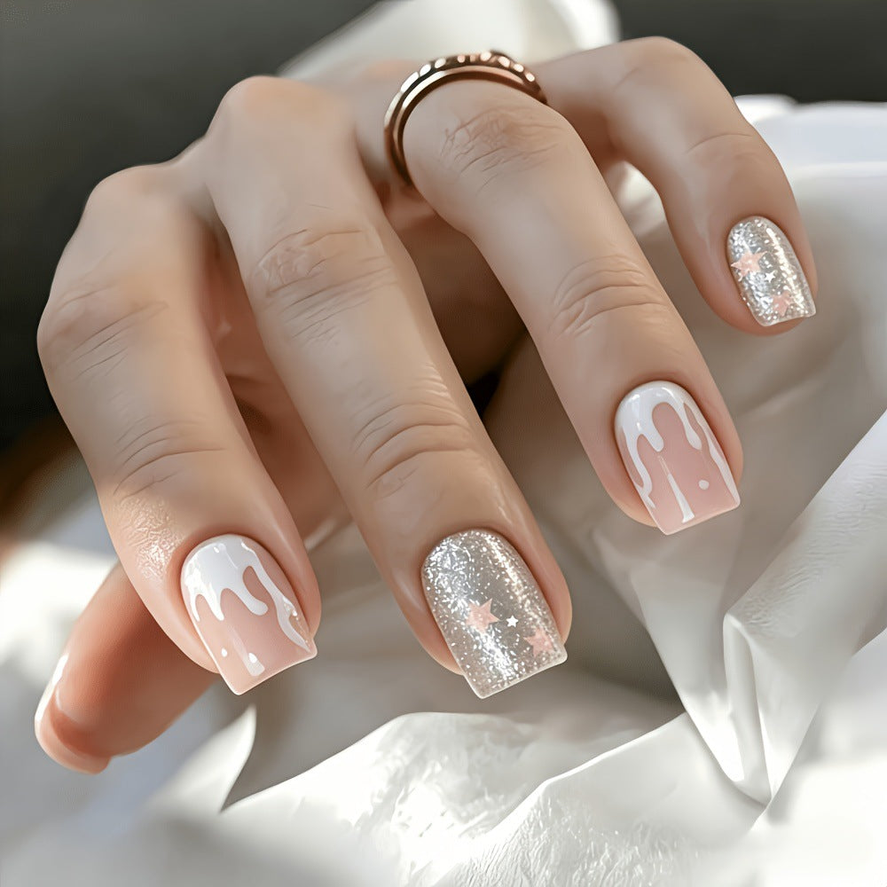 Glittering artificial nails with playful drop design Bowlift