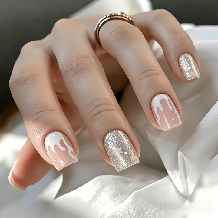 Glittering artificial nails with playful drop design Bowlift