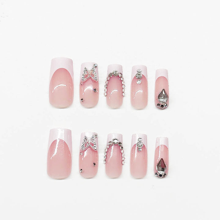 Acrylic nail set with elegant rhinestone and glitter decorations Bowlift