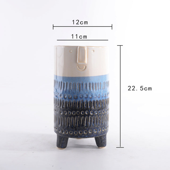 Decorative plant pot with facial features Bowlift