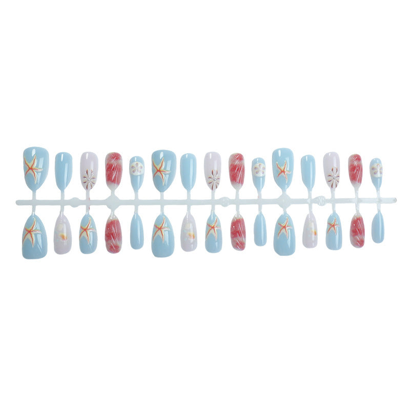 Artificial nails with maritime shell motifs Bowlift
