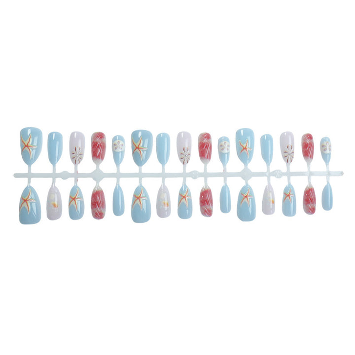 Artificial nails with maritime shell motifs Bowlift