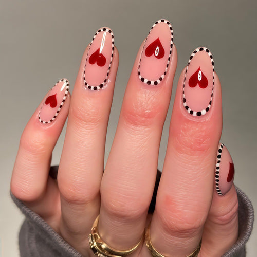 Artificial nails with heart-shaped accents Bowlift