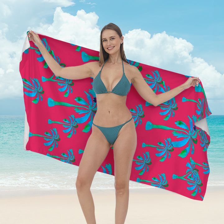 Beach towel with vibrant tropical plant motif Bowlift