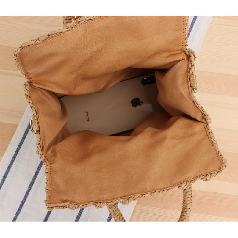 Handbag made of woven natural material with practical shoulder strap Bowlift