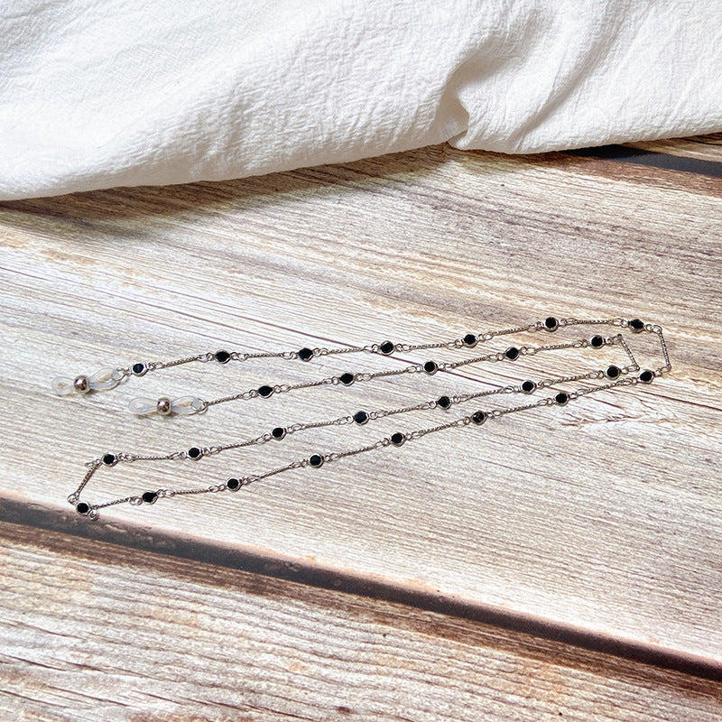 Elegant jewelry holder chain with onyx beads Bowlift