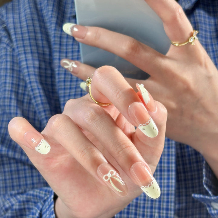 Artistic Almond-Shaped Press-On Nails with Floral Design Bowlift