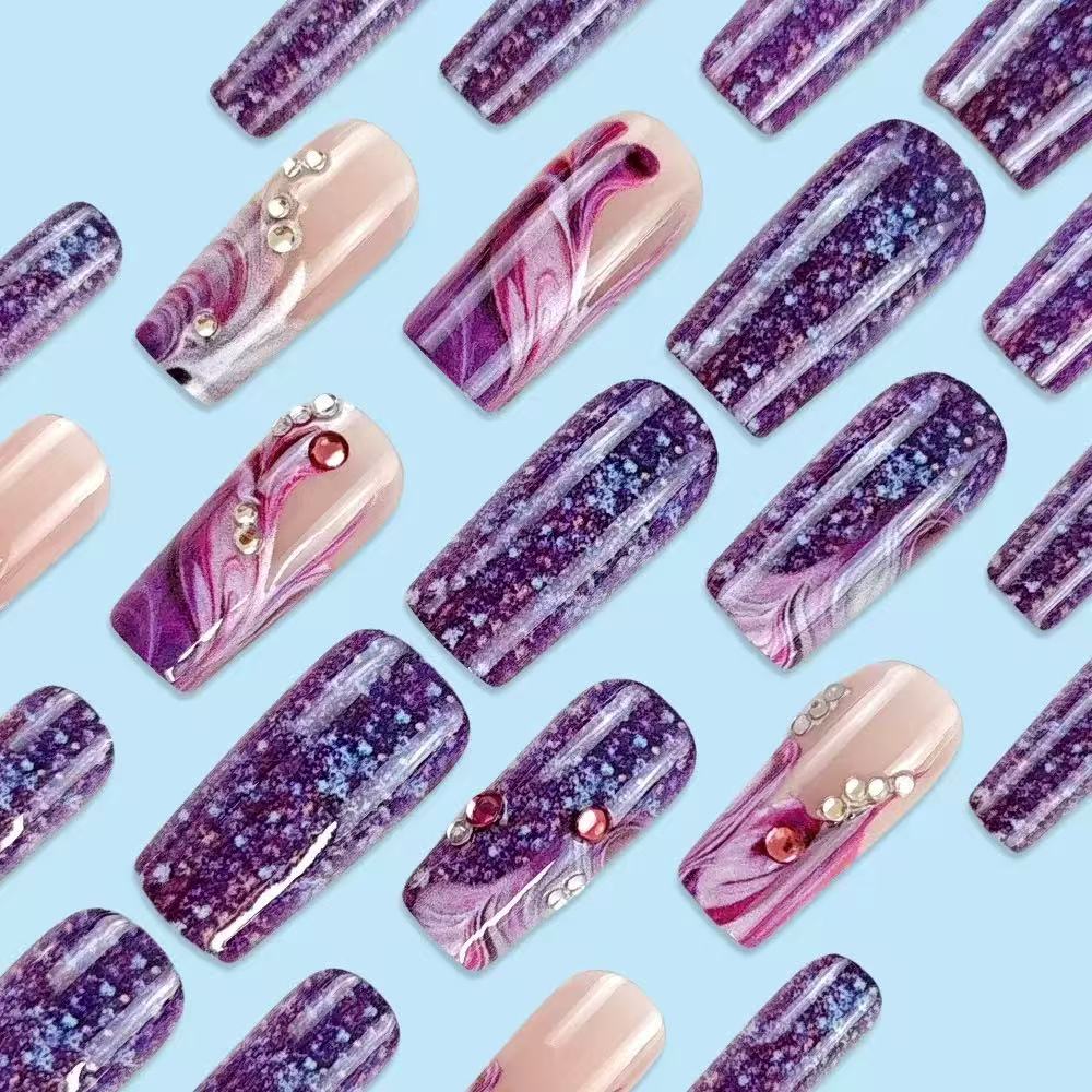 Acrylic nail set with luxurious color gradients and sparkling accents Bowlift
