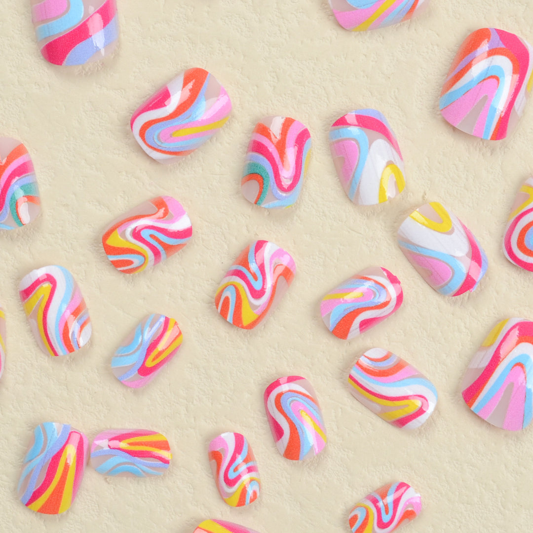 Acrylic nail set with colorful marble design and vibrant colors Bowlift