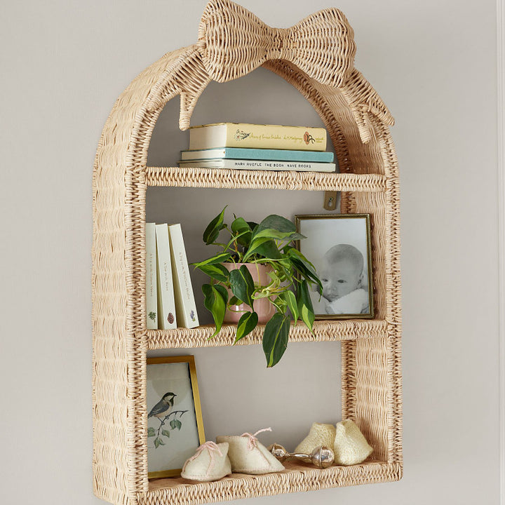 Playful wall shelf in butterfly design Bowlift