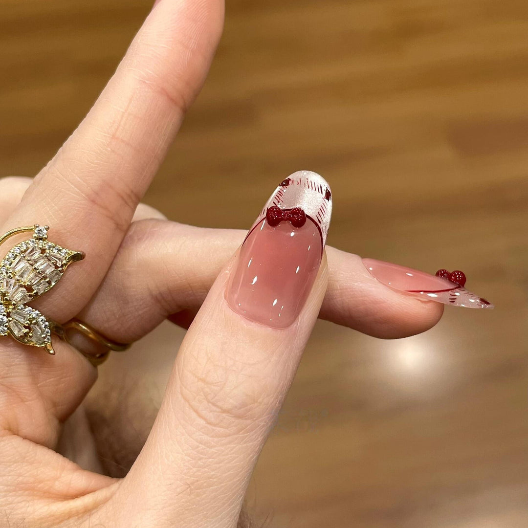 Artificial nails with playful Hello Kitty design Bowlift