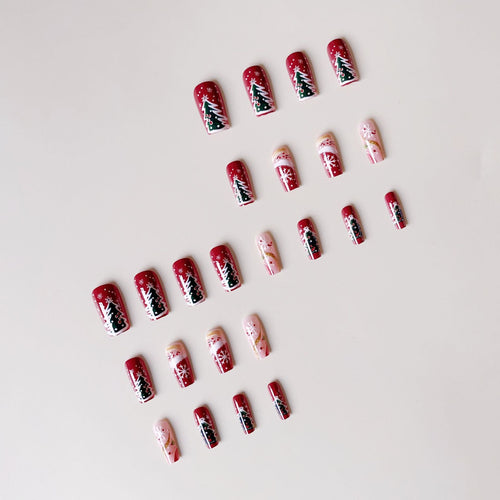 Artificial nail set with festive Christmas designs and glitter accents Bowlift
