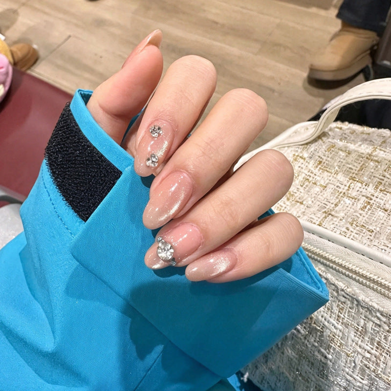 Artificial nail set with elegant rhinestone embellishments Bowlift
