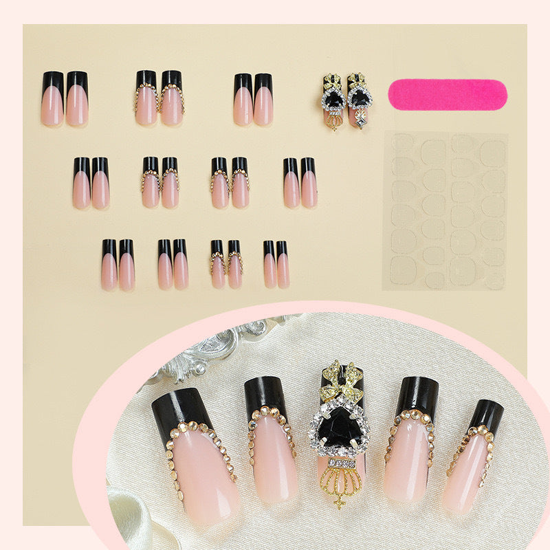 Luxury artificial nail set with sparkling rhinestone decorations and elegant accents Bowlift